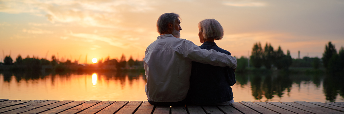 couple watching sunset about faragi group delaware