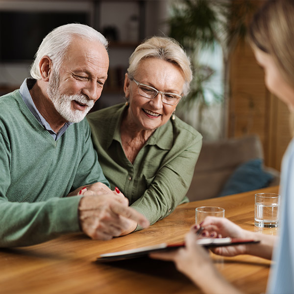 retirees meeting with financial advisor to discuss the keys to a successful retirement