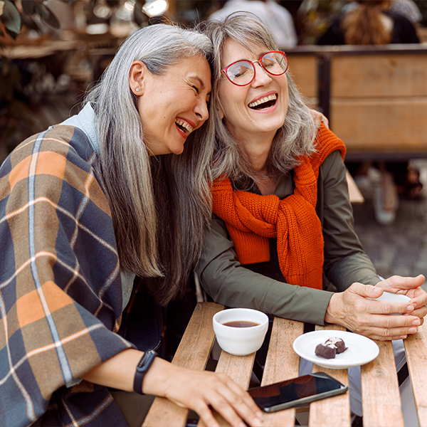 senior woman having coffe in city annuity income faragi group delaware