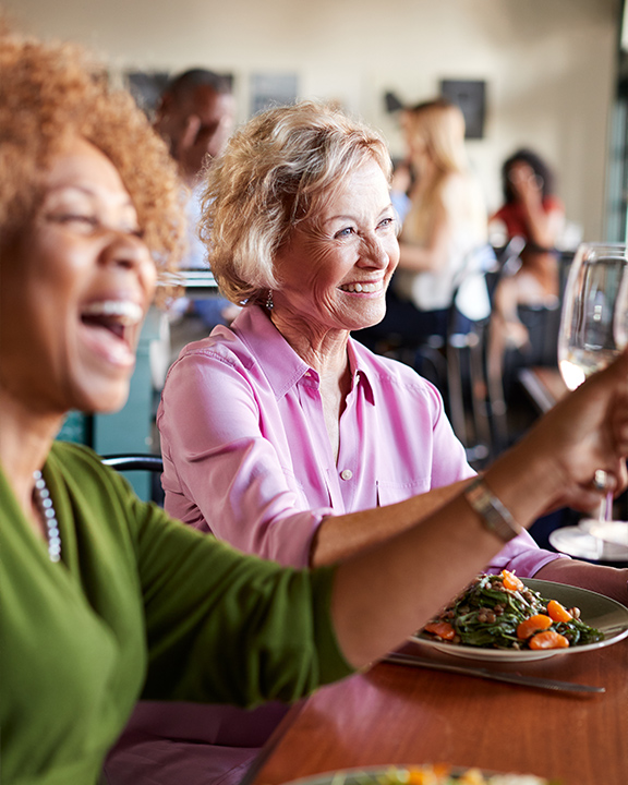 senior women at keys to a successful retirement dinner seminar